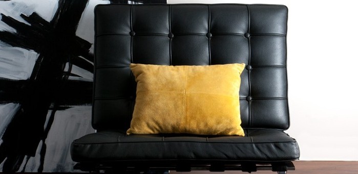 Black Chair with yellow pillow