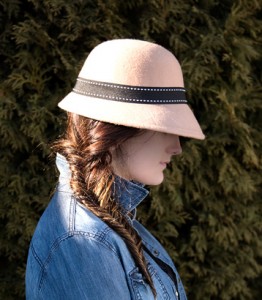 woman wearing jean jacket and hat