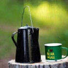 kettle and cup on a stump