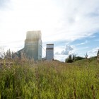 landscape with grain elevators in the background