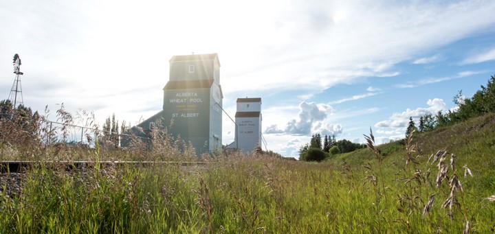 landscape with grain elevators in the background