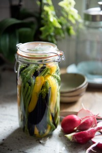 jar with dill, pickles, cucumber and beans