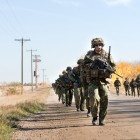 soldiers marching on road