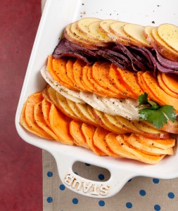 scalloped turnips and potatoes on a serving platter