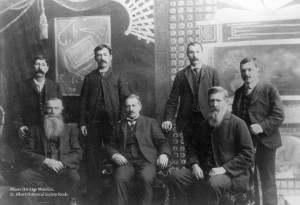 First town council in 1904.  Standing in back: Nazaire Asselin, Fleuri Perron, Henry Cunningham, Lucien Boudreau.  Seated in front: David Chevigny, Cheri Hebert (mayor), Joseph Leonard.