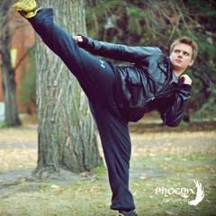 Third Degree Black Belt Daniel Friesen kicking around in the leaves!